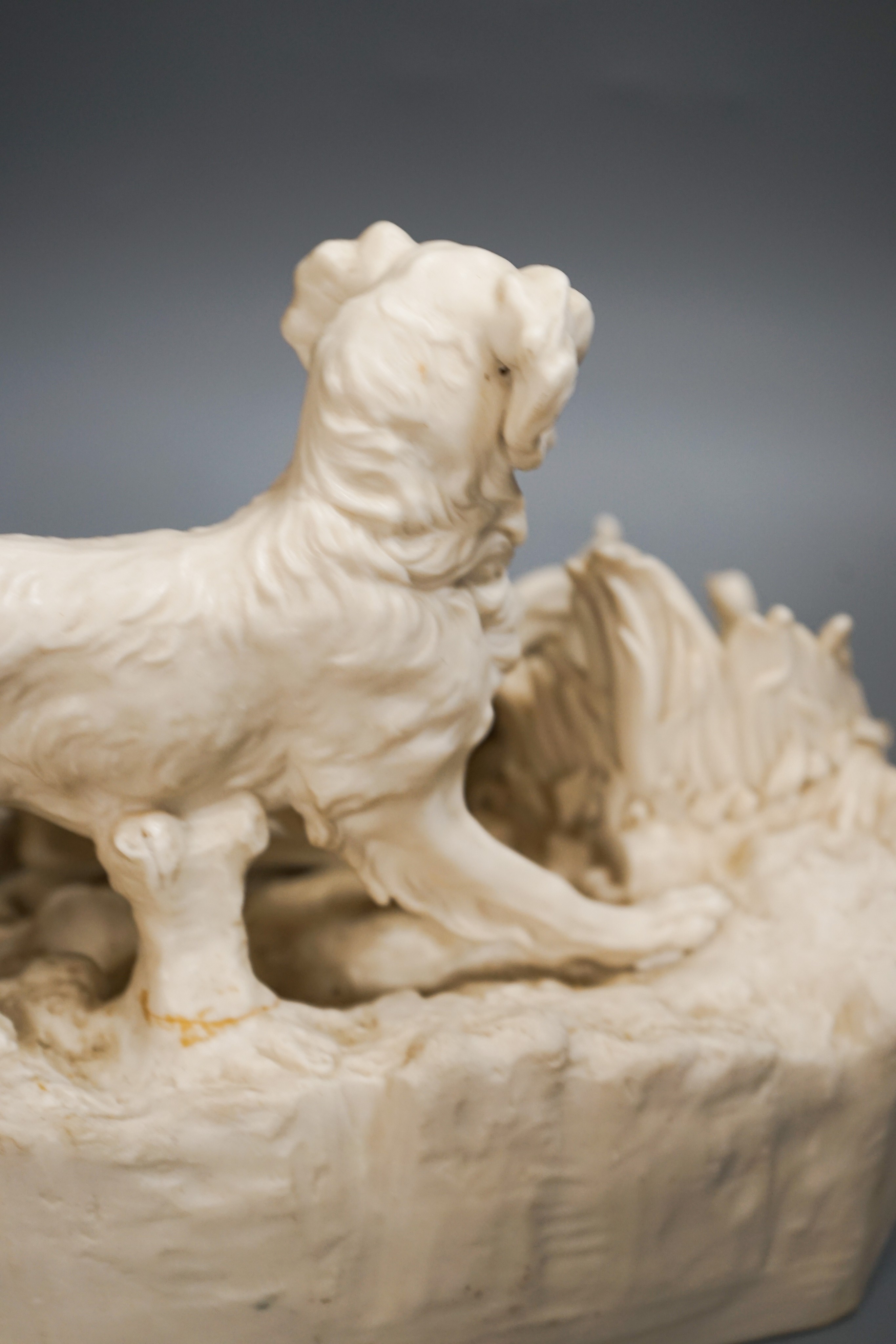 A Victorian parian group of two setters flushing a partridge, after Mene, 32cm (a.f.)
